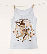 A silver colored tank top hanging from a string with clothespins, the print featuring a baby deer in a wreath of flowers with the words "darling deer."