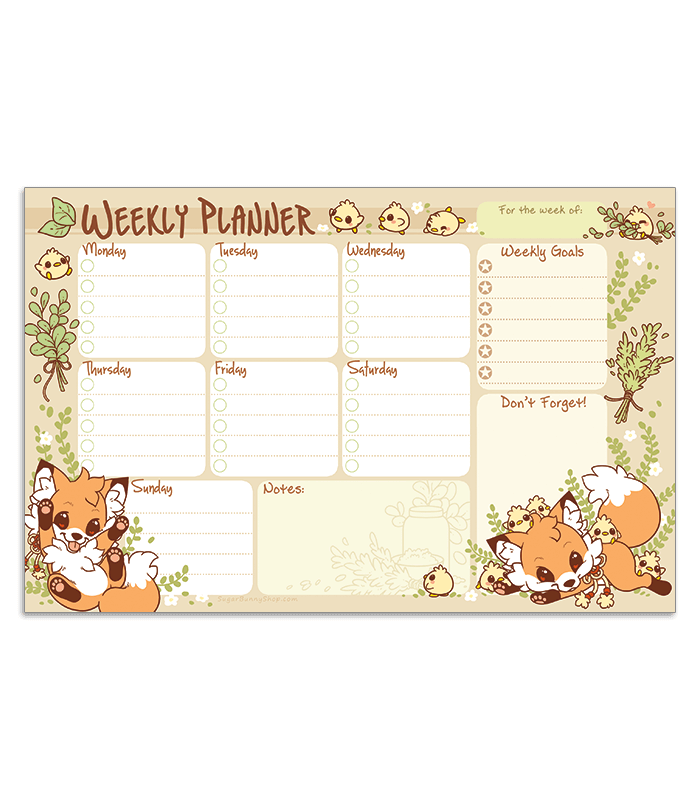 A photo of a weekly planner notepad on a wood table, the design featuring cute little foxes playing with yellow chicks, with task sections for each day of the week as well as extra notes and goals.