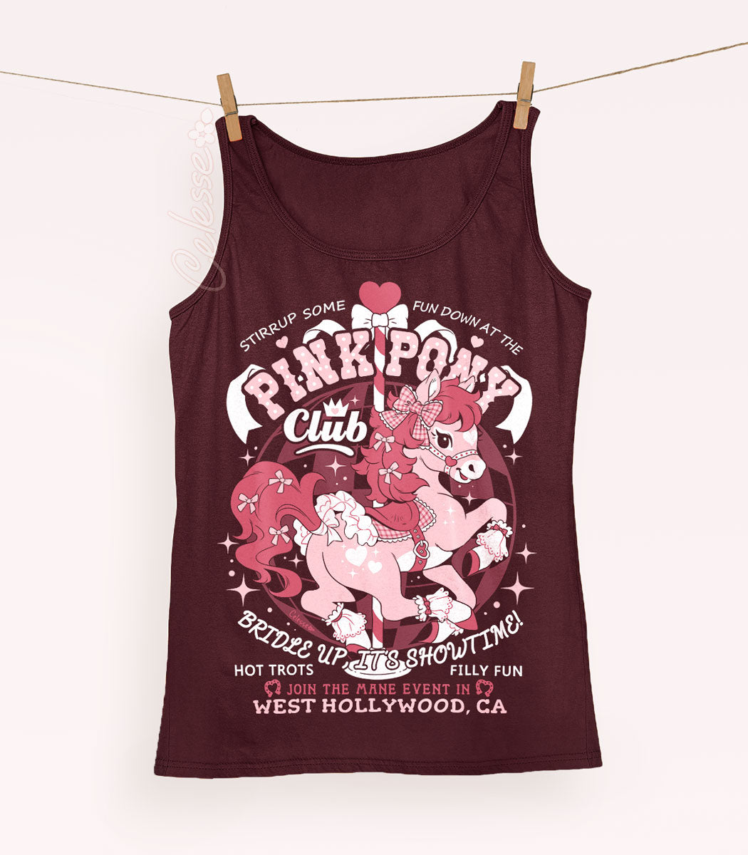 A maroon tank top pinned on a clothesline with a print of a logo for Pink Pony Club, the art featuring a prancing pink pony in frilly décor. The flavor text reads "Bridle up, it&