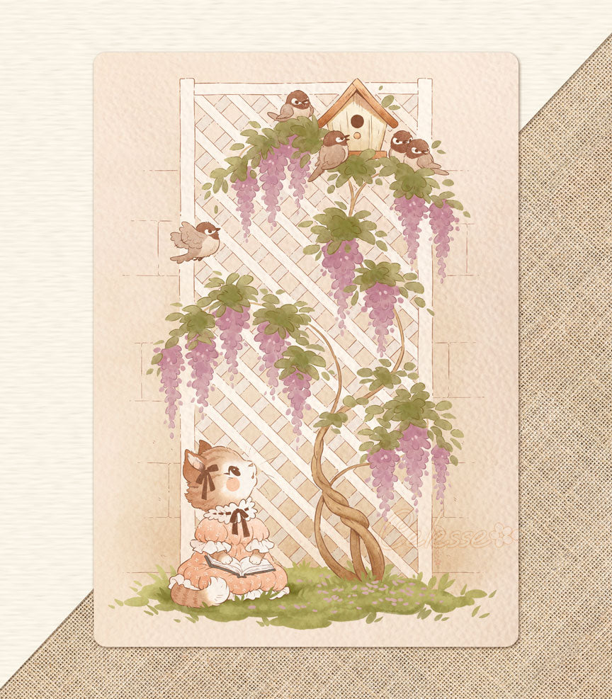 A photo of a textured art print featuring a soft drawing of a kitten in a vintage-style dress who is in a garden with a book in her lap, sitting at the base of a tall white lattice wall with purple wisteria growing up it. A bird house perches at the top of the lattice and chickadees sing and flit about, luring the kitten&
