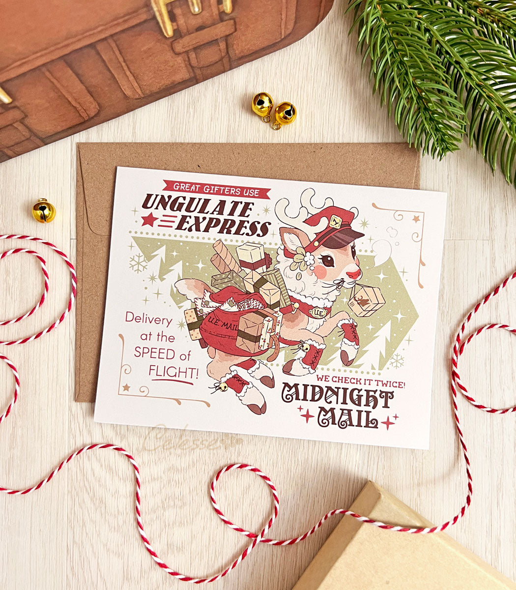 A photo of a Christmas greeting card featuring vintage style artwork of a faux advertisement for Ungulate Express Midnight Mail, with a galloping reindeer with a red nose wearing a mailman cap and carting a bag full of packages and gifts. An envelope, string and other decorations frame it.