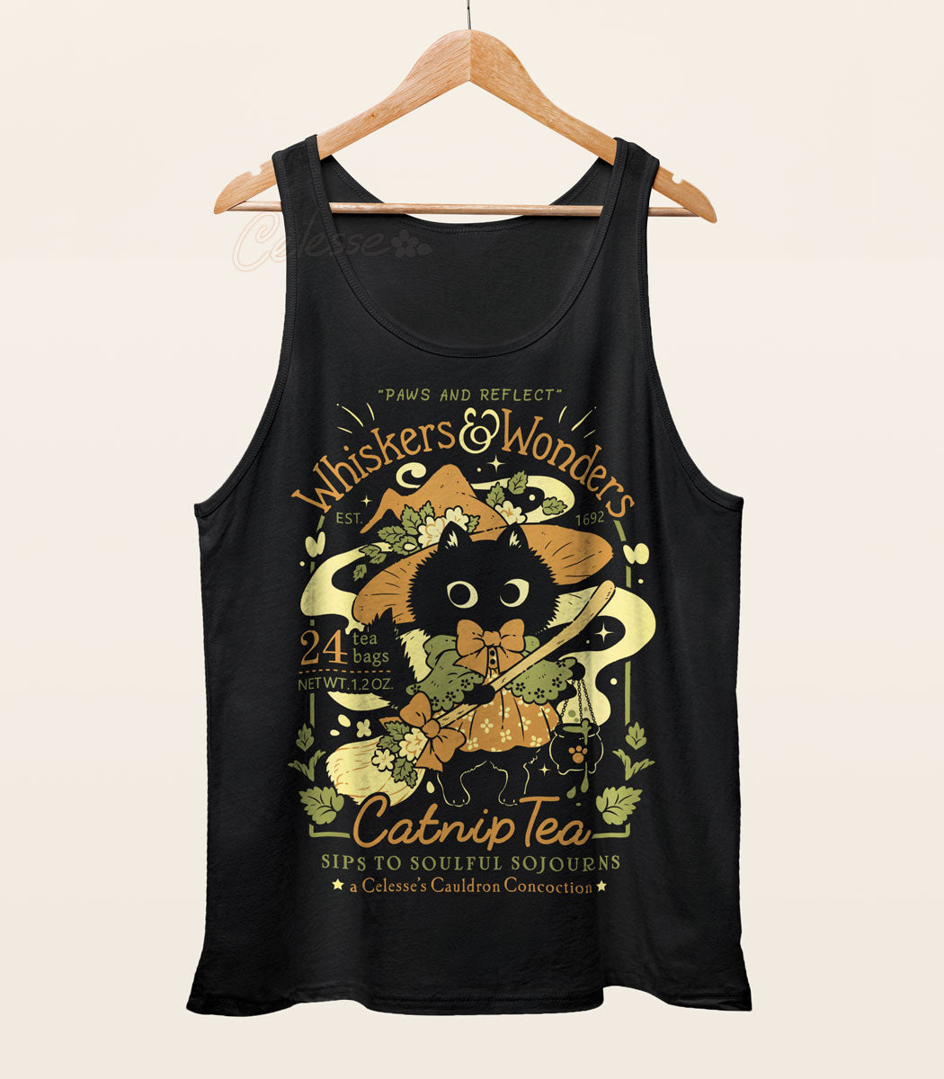 A black tank top on a wood hanger with a print featuring a faux logo for Whiskers &amp; Wonders Catnip Tea with a black witch cat in a witch hat and dress with a broom.